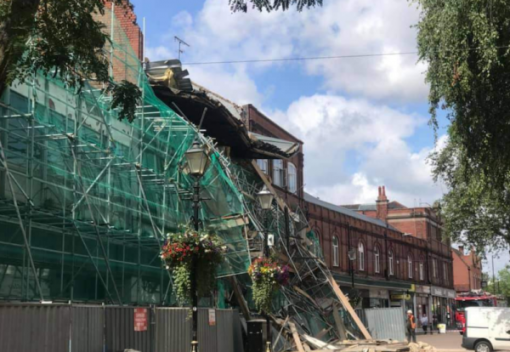 Part of an old Co-op building in Nuneaton collapsed during demolition work on Wednesday bringing down scaffolding